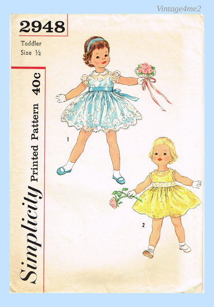 simplicity vintage dress 2948: 1950s Sweet Baby Girls Party 6mos Sewing Pattern msrp-update_8.2.24 Alma One Sleeve Crystal Color:Vine Print in Ebony